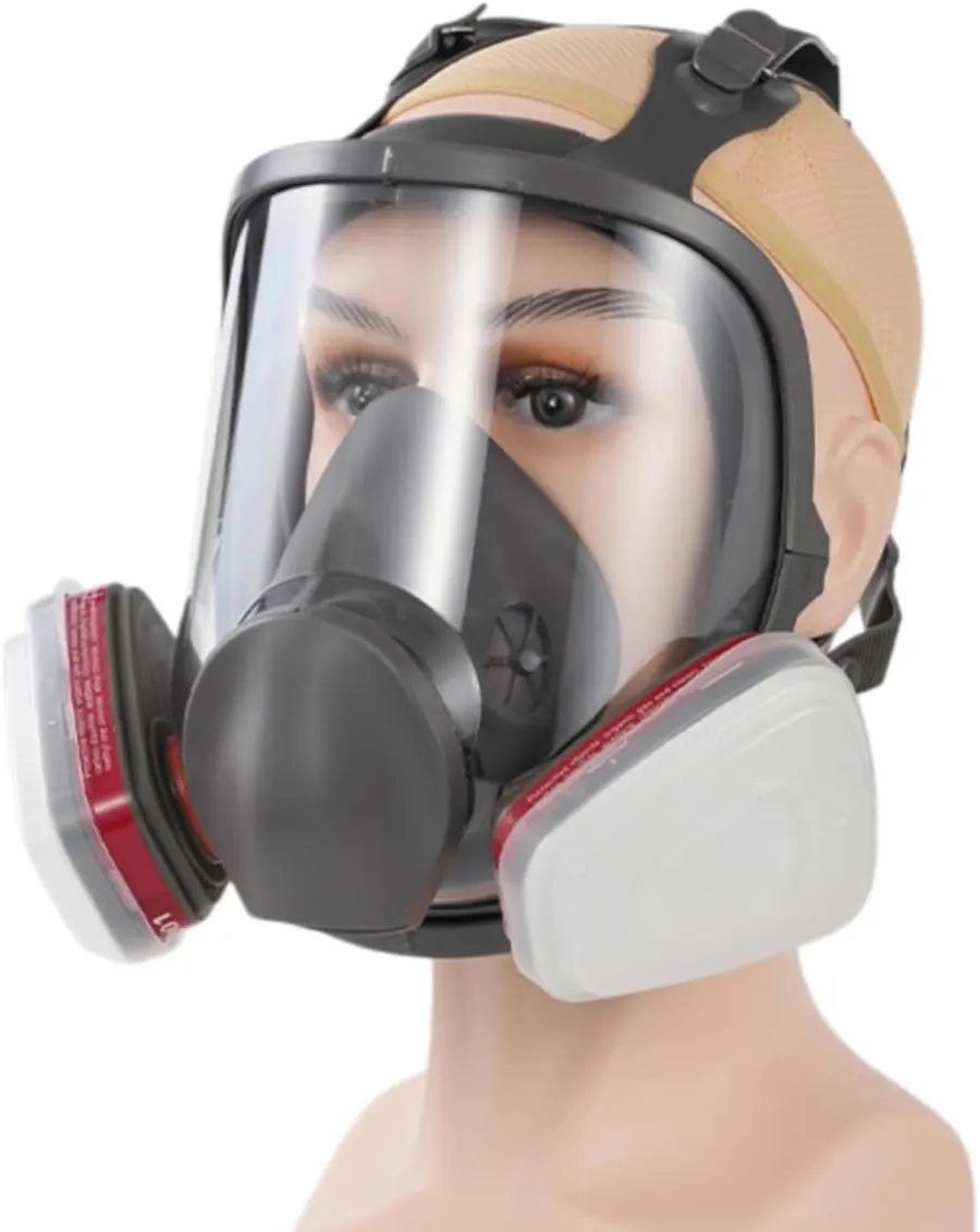 A mannequin head wearing a full-face respirator, used as a product display.